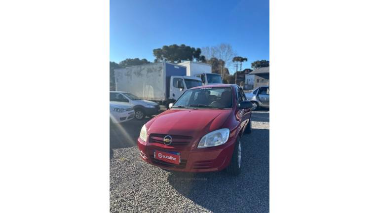 CHEVROLET - PRISMA - 2010/2011 - Vermelha - R$ 29.900,00
